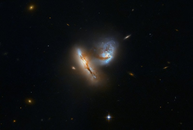 Hubble captures dance of two merging galaxies