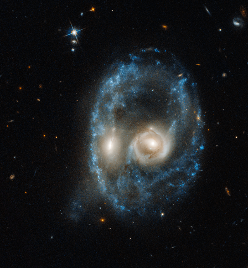 These colliding galaxies paint a ghostly picture